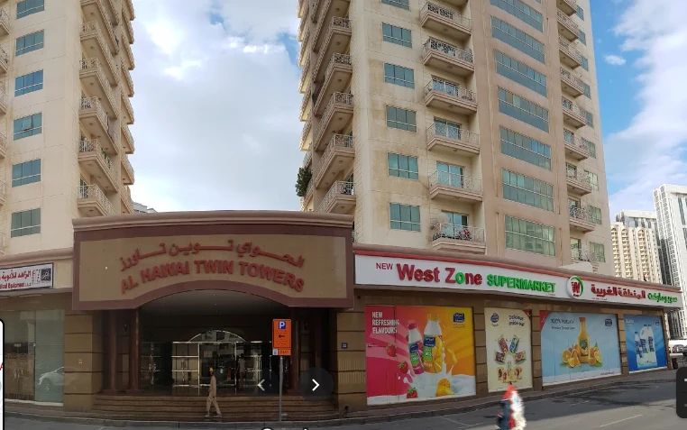 Al_Hawai_Twin_Towers-Al_Nahda-bld.png